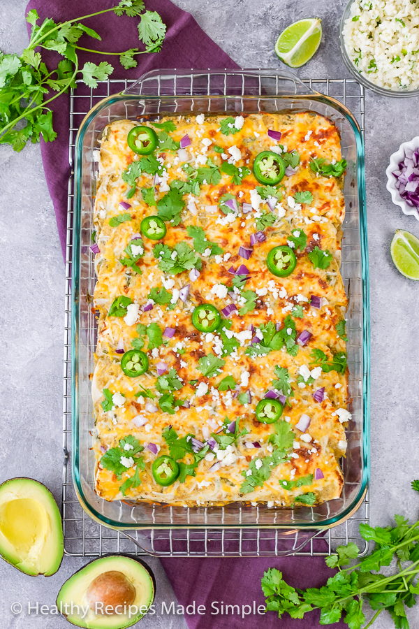 Overhead shot of a pan of salsa verde chicken enchiladas.