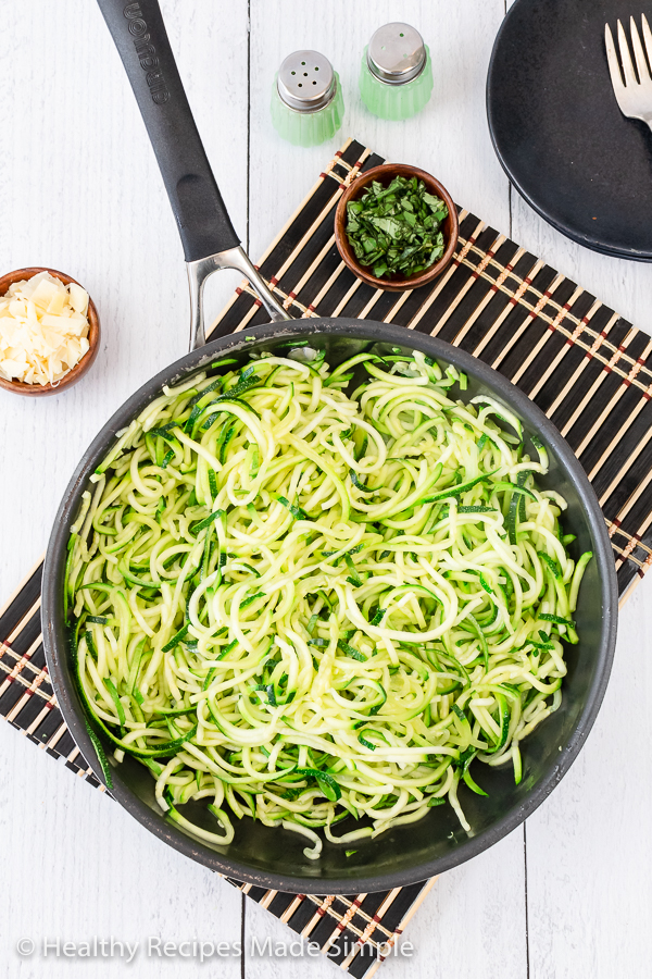 A pan full of zucchini noodles.