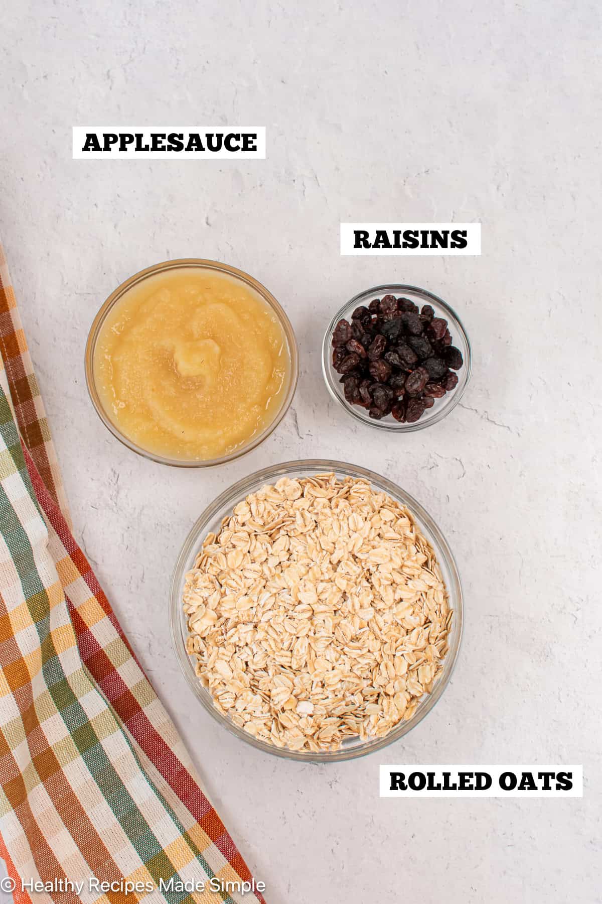 Bowls of ingredients needed to make oat cookies.